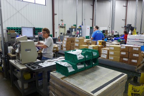 Workers process parts orders for delivery to Endries customers. 