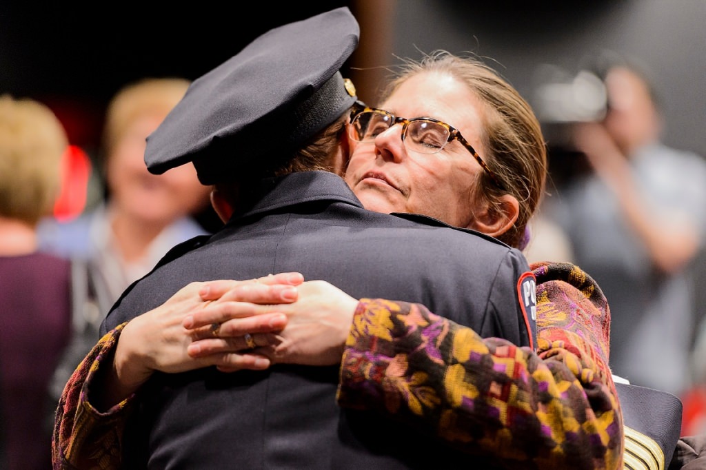 Photo: Kristen Roman hugging Beth Binhammer