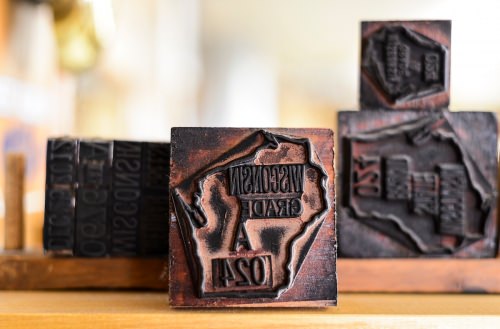 Stamps used to mark and grade packages of Wisconsin-made cheese are pictured at Roelli Cheese Haus in Shullsburg, Wis.