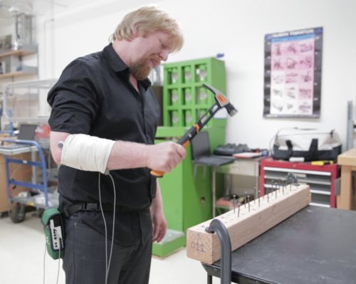 Volunteers pounded nails with Fiskars’ new IsoCore hammer while researchers — hoping to determine how the hammer helped prevent overuse injuries — measured muscle activity in their forearms. 