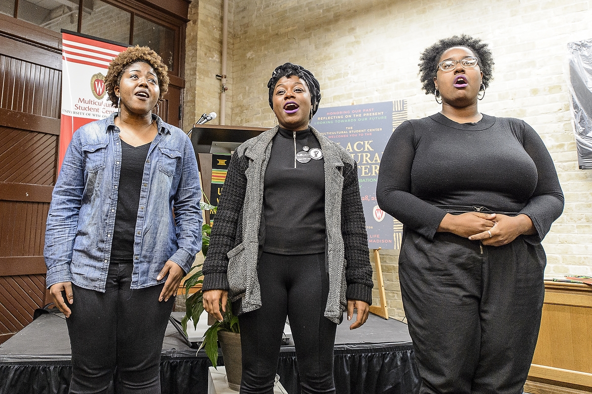 Nikeya Bramlett, Deja Mason and Bobbie Briggs, members of the University Gospel Choir, perform before a crowd of over 100 people during a dedication and libation ceremony for the new Black Cultural Center.