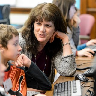 Andrea Arpaci-Dusseau, Professor of Computer Sciences, Van Hise Outreach Award Andrea Arpaci-Dusseau is a faculty member who most passionately and consistently extends the value of computer science beyond boundaries of the department and university. She created CS 402, formally titled "Introducing Computer Science to K-12 Students." The class is a service-learning course, in which UW students are taught how to teach algorithmic thinking, core conceptual CS ideas, and practical and fun programming skills to young children. The UW students learn how to be teachers first by teaching each other, and then perform a valuable community service: in small groups, the UW students run weekly after-school clubs at Madison-area elementary schools, middle schools, and other community centers. She started this work after her 2006-2007 sabbatical at just a single elementary school, but since this time the program has blossomed. In spring of '17), CS 402 students will run clubs at roughly 15 schools and other venues, such as the Madison Children's Museum. Since its inception, more than 2,000 children have participated in the program, better prepared for a digital world. Watch here for an interview.