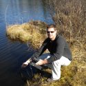 Ryan Batt takes a reading of oxygen levels in a Center for Limnology study lake in Northern Wisconsin. 