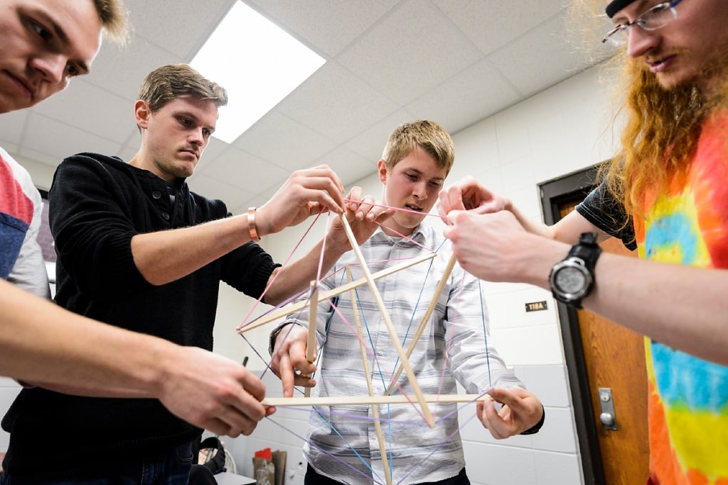 Photo: Leo Steiner and classmates holding model