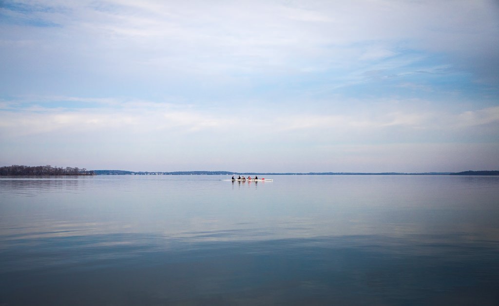 Campus may be empty while students are on spring break, but Wisconsin Men's Rowing is keeping it busy on Lake Mendota.  (Photo by Hyunsoo Leo Kim | University Communications)