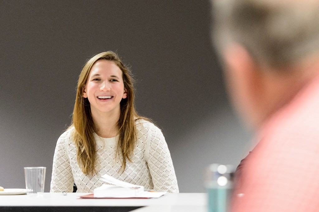 UW-Madison Ph.D. student Molly Harris listens during a discussion session held by the Warrior Book Club at the Wisconsin Veterans Museum on March 15, 2017. The club is a collaborative effort between the Wisconsin Veterans Museum and University of Wisconsin–Madison PhD candidate Molly Harris, who is the moderator of the club. The club consists of veterans, service providers and members of the public who meet monthly to discuss classical and contemporary literature centered on themes related to war. The book being discussed during this session was Learning to Stay by Erin Celello. (Photo by Bryce Richter / UW–Madison)