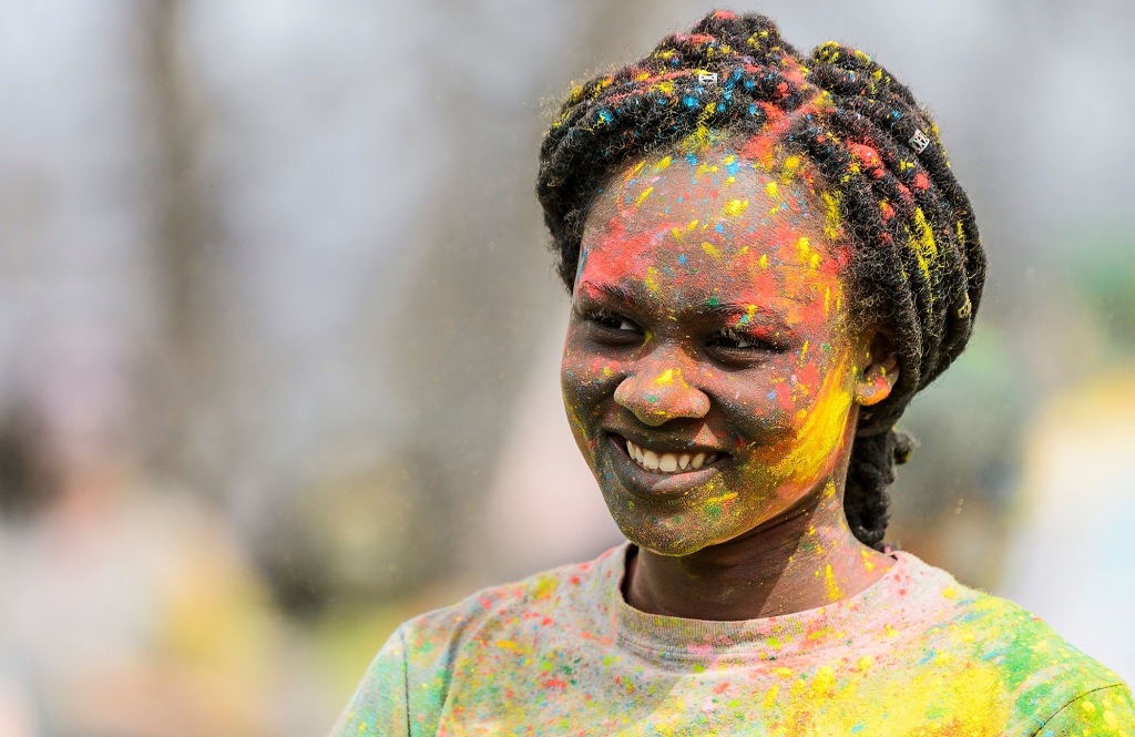 Hundreds of students participate in the spirited Hindu tradition of throwing colored powder during Rang de Madison, a Holi festival of color hosted by the Madison Hindu Students Association outside of Dejope Residence Hall at the University of Wisconsin-Madison on April 15, 2017. The event, which celebrates the arrival of spring and victory of good over evil, was held in collaboration with UW-Madison's India Students Association and Indian Graduate Students Association. (Photo by Jeff Miller/UW-Madison)