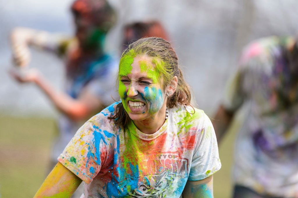 Hundreds of students participate in the spirited Hindu tradition of throwing colored powder during Rang de Madison, a Holi festival of color hosted by the Madison Hindu Students Association outside of Dejope Residence Hall at the University of Wisconsin-Madison on April 15, 2017. The event, which celebrates the arrival of spring and victory of good over evil, was held in collaboration with UW-Madison's India Students Association and Indian Graduate Students Association. (Photo by Jeff Miller/UW-Madison)