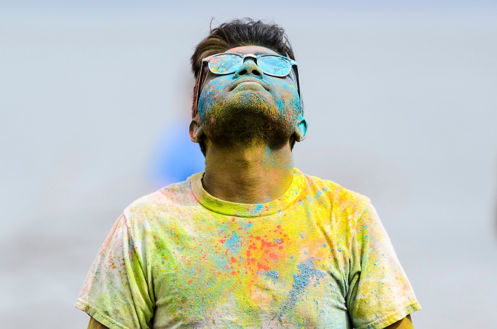 Hundreds of students participate in the spirited Hindu tradition of throwing colored powder during Rang de Madison, a Holi festival of color hosted by the Madison Hindu Students Association outside of Dejope Residence Hall at the University of Wisconsin-Madison on April 15, 2017. The event, which celebrates the arrival of spring and victory of good over evil, was held in collaboration with UW-Madison's India Students Association and Indian Graduate Students Association. (Photo by Jeff Miller/UW-Madison)