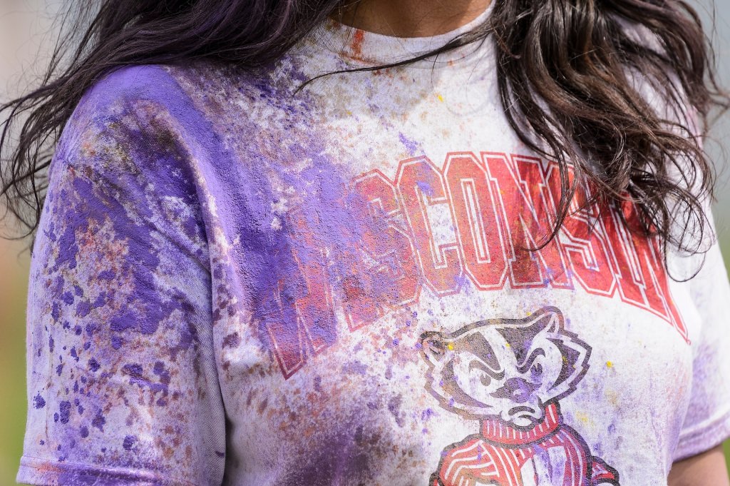 Hundreds of students participate in the spirited Hindu tradition of throwing colored powder during Rang de Madison, a Holi festival of color hosted by the Madison Hindu Students Association outside of Dejope Residence Hall at the University of Wisconsin-Madison on April 15, 2017. The event, which celebrates the arrival of spring and victory of good over evil, was held in collaboration with UW-Madison's India Students Association and Indian Graduate Students Association. (Photo by Jeff Miller/UW-Madison)