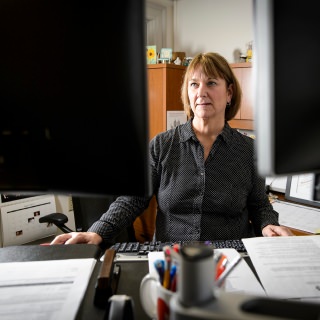 Sue Duhr, budget manager for the Division of Student Life at the University of Wisconsin-Madison, works on her computer in Bascom Hall on April 6, 2017. Duhr is a recipient of a 2017 University Staff Recognition Award. (Photo by Bryce Richter / UW-Madison)