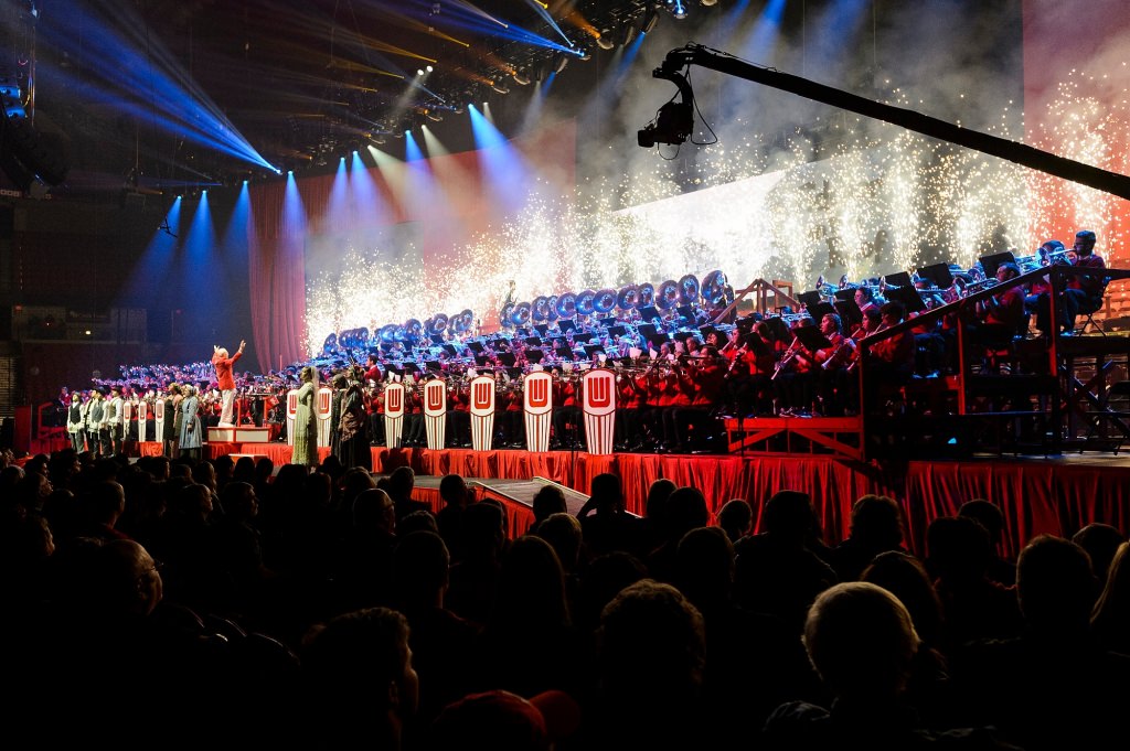 Pyrotechnics go off behind stage toward during the finale of the 43rd annual UW Varsity Band Spring Concert at the Kohl Center at the University of Wisconsin-Madison on April 20, 2017. This year's concert, entitled "Nobody Does It Better: 20 Years at the Kohl," comes after band director Mike Leckrone's return to campus following recovery from a medical procedure this past winter. Leckrone is 80 and now in his 47th year at UW-Madison. (Photo by Jeff Miller/UW-Madison)