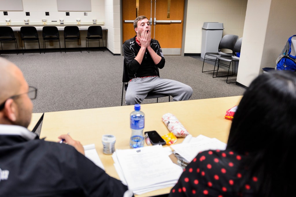 After performing a two-minute skit, first-year student Tanner Pettit – who has former experience as an Easter bunny mascot – hesitates when he can't name several key UW-Madison officials while interviewing with a panel of judges during a final tryout session for one of seven positions on the 2017-2018 Bucky Badger mascot team. The event was held in the Field House media center at the University of Wisconsin-Madison on April 19, 2017. Pettit ultimately made the team. (Photo by Jeff Miller/UW-Madison)