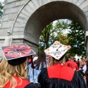 Many graduates chose to make a grand entrance through the Camp Randall Memorial Arch.