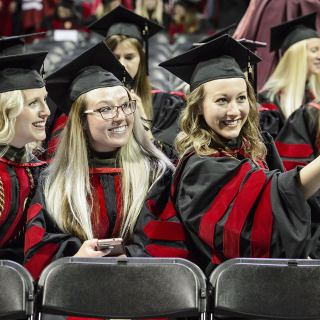 Pharmacy doctoral graduates Taryn Hinners, Lauren Arndt and Amy Hoffman (left to right) take a selfie.