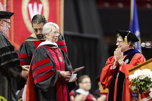 Tashia Morgridge receives an honorary degree during UW–Madison's spring commencement ceremony at the Kohl Center at the University of Wisconsin–Madison on May 12, 2017. The indoor graduation was attended by approximately 830 doctoral, MFA and medical student degree candidates, plus their guests. (Photo by Bryce Richter / UW–Madison)