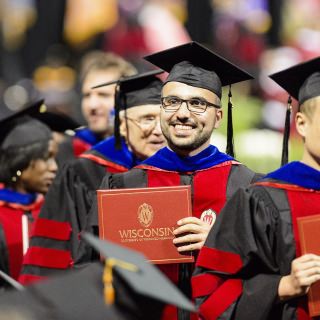 Newly designed robes brought more pops of red to the festivities.