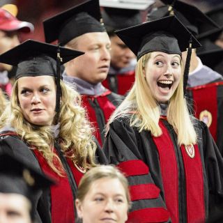 Tyler Bengtson shows her excitement about about receiving her doctorate in veterinary medicine.