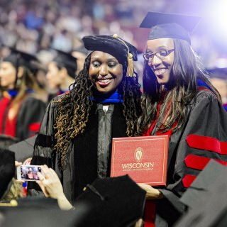 Graduates share a memorable moment.