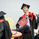 All week, flocks of soon-to-be graduates have covered campus, celebrating and capturing photos of this special time. Jason Hsu exults on the Memorial Union Terrace.