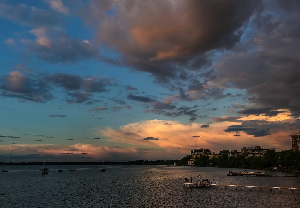 Setting sun illuminates layers of clouds with different tonality Monday evening. (Photo by Hyunsoo Leo Kim | University Communications)