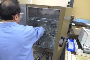 A Silatronix researcher at work at the company's east-side Madison offices.