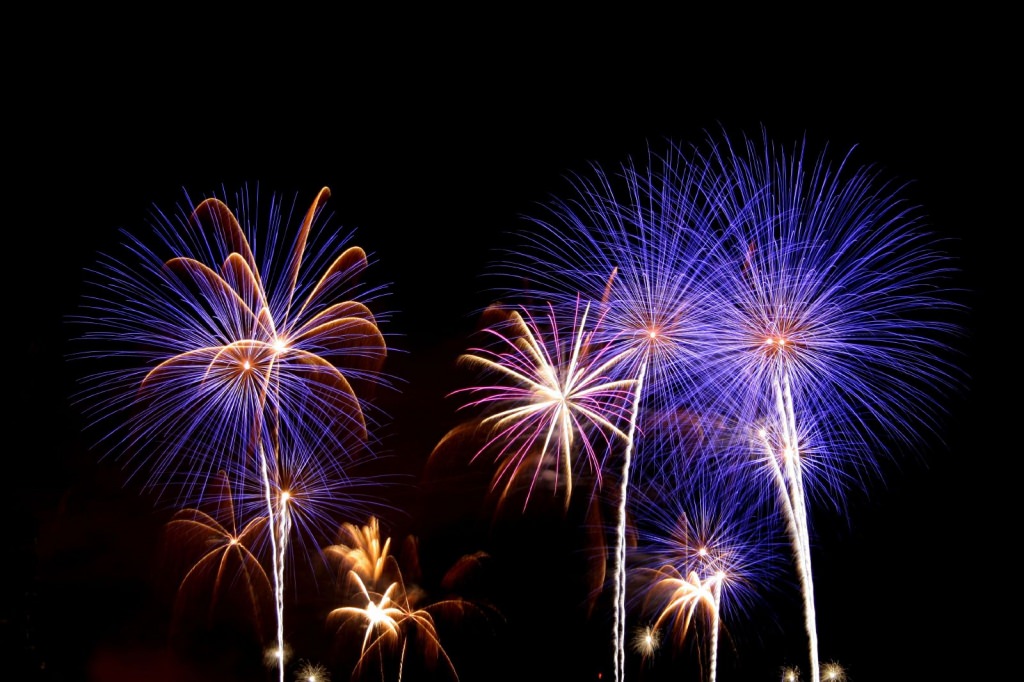 Photo: Fireworks exploding in night sky