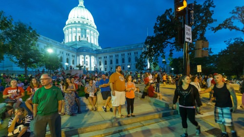 People watch a musical act at the 2014 Taste of Madison. Courtesy of John Benson.