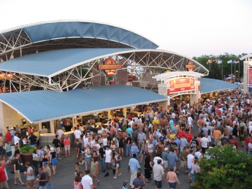 Summerfest attendees gather outside of one of the festival's 11 stages. Courtesy of Mike Bash