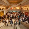 Artist Jim Dine leads the way to Gallery I at the unveiling of his new mural for the Chazen Museum of Art.