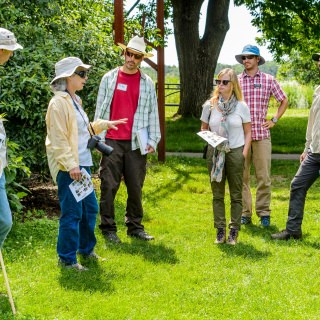 Photo: Susan Carpenter talking to group outdoors