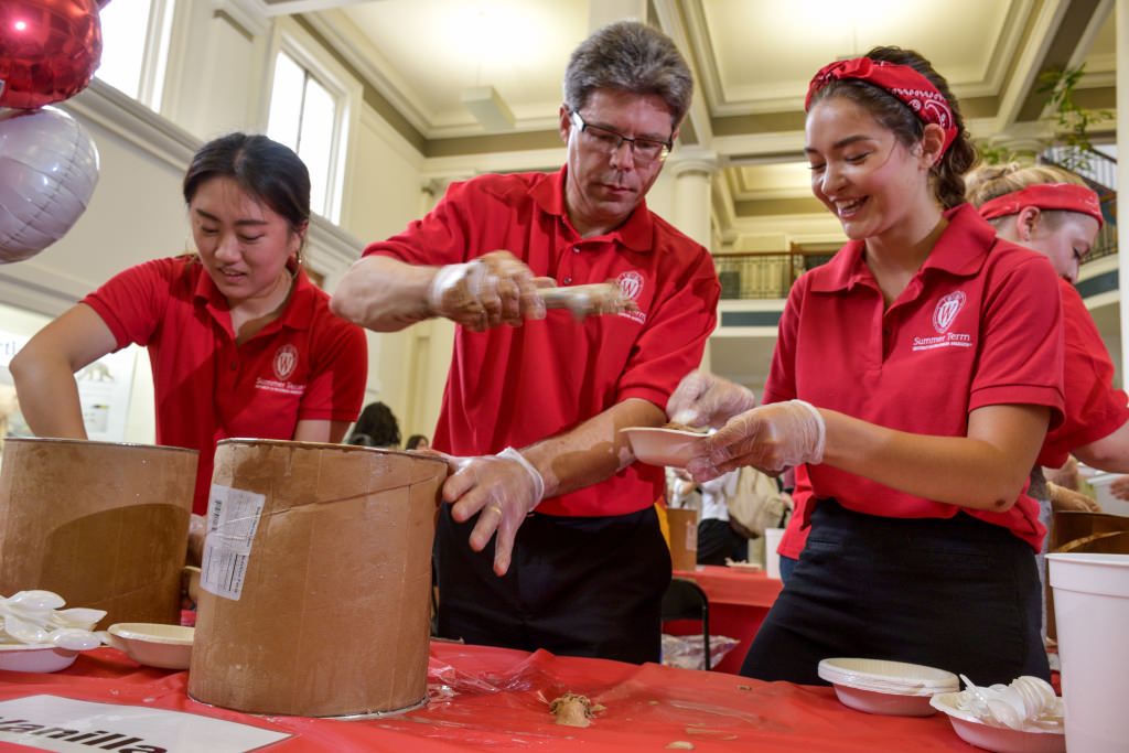 On Wednesday, July 12 the Summer Term staff hosted an ice cream social for students, faculty and staff. Celebrating the thriving environment on campus this summer, the team dished out 45 gallons of Babcock Dairy ice cream to more than 1,000 guests, joined by Bucky Badger and the UW marching band. (Photo by David F. Giroux)