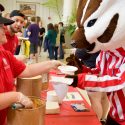 On Wednesday, July 12 the Summer Term staff hosted an ice cream social for students, faculty and staff. Celebrating the thriving environment on campus this summer, the team dished out 45 gallons of Babcock Dairy ice cream to more than 1,000 guests, joined by Bucky Badger and the UW marching band. (Photo by David F. Giroux)