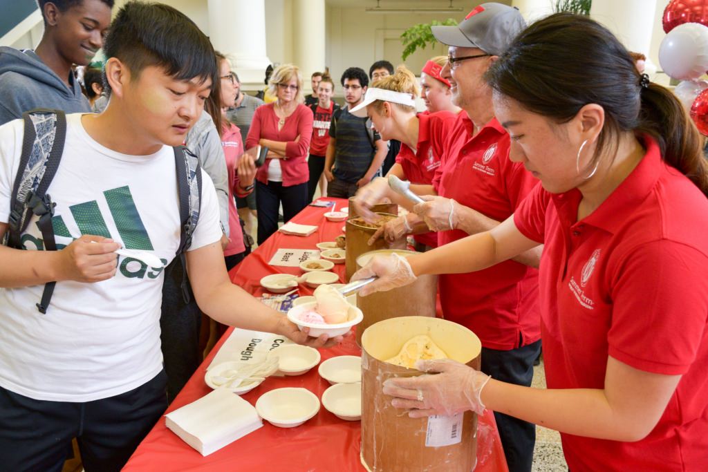 On Wednesday, July 12 the Summer Term staff hosted an ice cream social for students, faculty and staff. Celebrating the thriving environment on campus this summer, the team dished out 45 gallons of Babcock Dairy ice cream to more than 1,000 guests, joined by Bucky Badger and the UW marching band. (Photo by David F. Giroux)