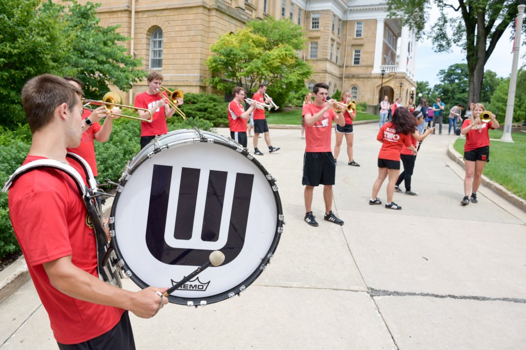 On Wednesday, July 12 the Summer Term staff hosted an ice cream social for students, faculty and staff. Celebrating the thriving environment on campus this summer, the team dished out 45 gallons of Babcock Dairy ice cream to more than 1,000 guests, joined by Bucky Badger and the UW marching band. (Photo by David F. Giroux)