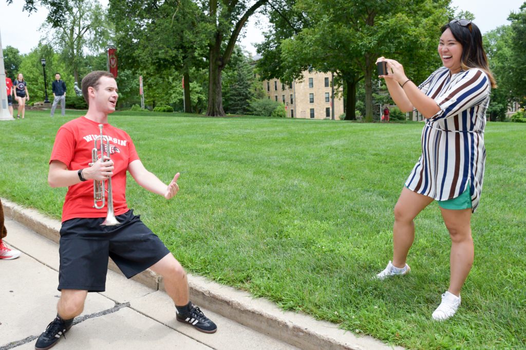 On Wednesday, July 12 the Summer Term staff hosted an ice cream social for students, faculty and staff. Celebrating the thriving environment on campus this summer, the team dished out 45 gallons of Babcock Dairy ice cream to more than 1,000 guests, joined by Bucky Badger and the UW marching band. (Photo by David F. Giroux)