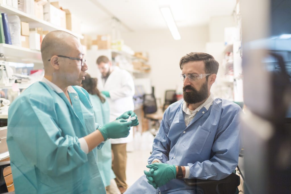 Photo: Jue Zhang and Matt Brown in lab