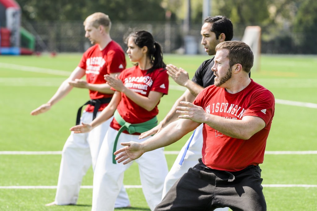 Photo: Members of karate club practicing