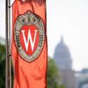 W crest banner and state capitol dome