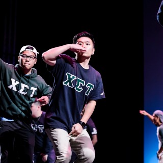 Student members of Chi Sigma Tau National Fraternity, Inc. -- part of the Multicultural Greek Council (MGC ) -- stroll and salute during the Multicultural Orientation and Reception (MCOR) at the Wisconsin Union Theater's Shannon Hall at the University of Wisconsin-Madison on September 6, 2017. MCOR is part of a series of beginning-of-the-semester Wisconsin Welcome events. (Photo by Jeff Miller / UW-Madison)