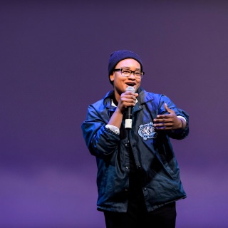 Co-master of ceremonies Nia Scott entertains the crowd during the Multicultural Orientation and Reception (MCOR) at the Wisconsin Union Theater's Shannon Hall at the University of Wisconsin-Madison on September 6, 2017. MCOR is part of a series of beginning-of-the-semester Wisconsin Welcome events. (Photo by Jeff Miller / UW-Madison)