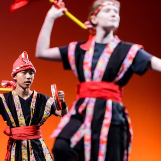 Student members of Anaguma Eisa, UW-Madison's Okinawan Taiko Club, perform traditional Japanese drumming during the Multicultural Orientation and Reception (MCOR) at the Wisconsin Union Theater's Shannon Hall at the University of Wisconsin-Madison on September 6, 2017. MCOR is part of a series of beginning-of-the-semester Wisconsin Welcome events. (Photo by Jeff Miller / UW-Madison)