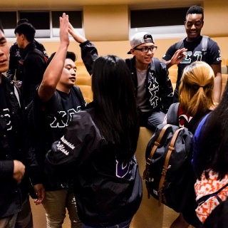 Student members of Chi Sigma Tau National Fraternity, Inc. -- part of the Multicultural Greek Council (MGC) -- celebrate following the Multicultural Orientation and Reception (MCOR) at the Wisconsin Union Theater's Shannon Hall at the University of Wisconsin-Madison on September 6, 2017. MCOR is part of a series of beginning-of-the-semester Wisconsin Welcome events. (Photo by Jeff Miller / UW-Madison)