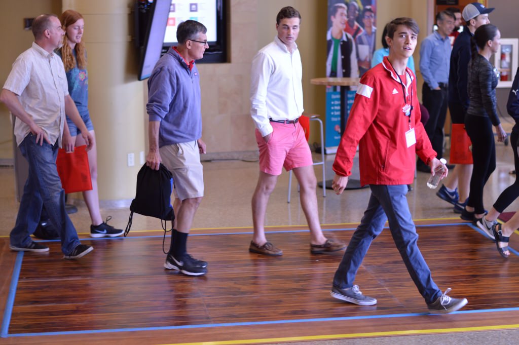 Photo: People walking across energy-harvesting floor