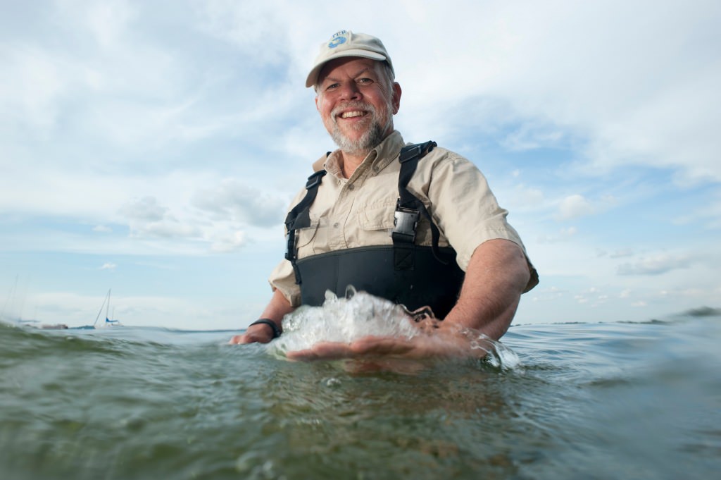 Photo: Steve Carpenter standing in Lake Mendota in hip waders