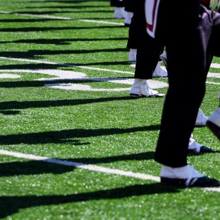 Members of the UW Marching Band high-step on the field during halftime as the Wisconsin Badgers take on the Maryland Terrapins during a UW Homecoming football game at Camp Randall Stadium at the University of Wisconsin-Madison on Oct. 21, 2017. Wisconsin won the game, 38-13. (Photo by Jeff Miller / UW-Madison)