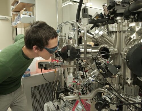 Photo: Julian Irwin checking lab equipment