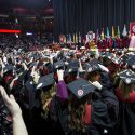 Photo of graduates singing 