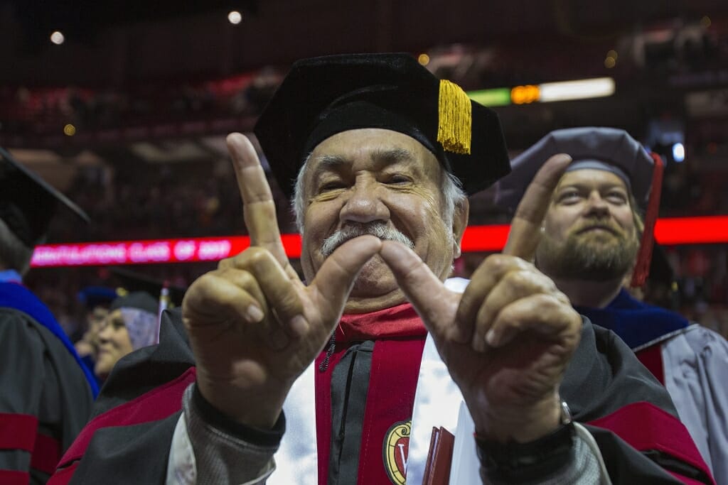 Photo of Barraza flashing the "W."