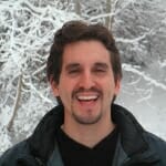 Portrait of Zuckerberg outdoors in front of snow-covered branches